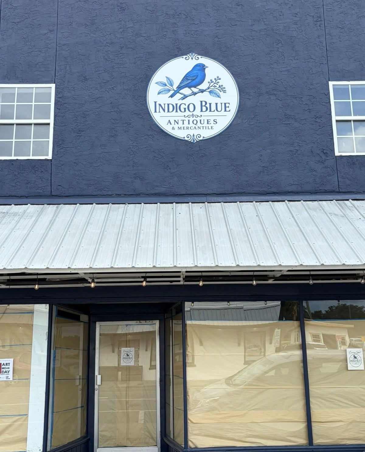 Indigo Blue Antiques: storefront wall sign